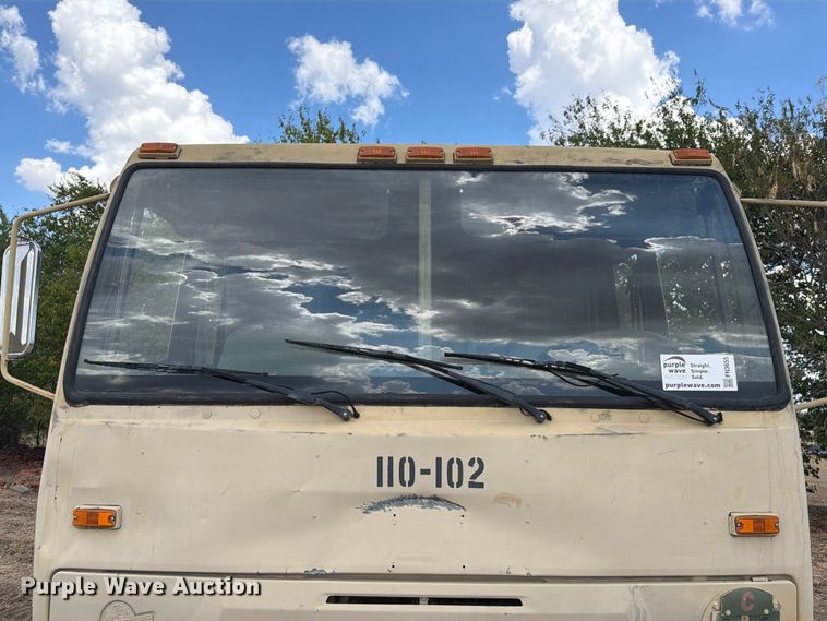 image for item FN3655 2004 Stewart & Stevenson 4X4 flatbed truck