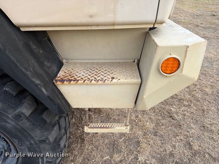 image for item FN3655 2004 Stewart & Stevenson 4X4 flatbed truck