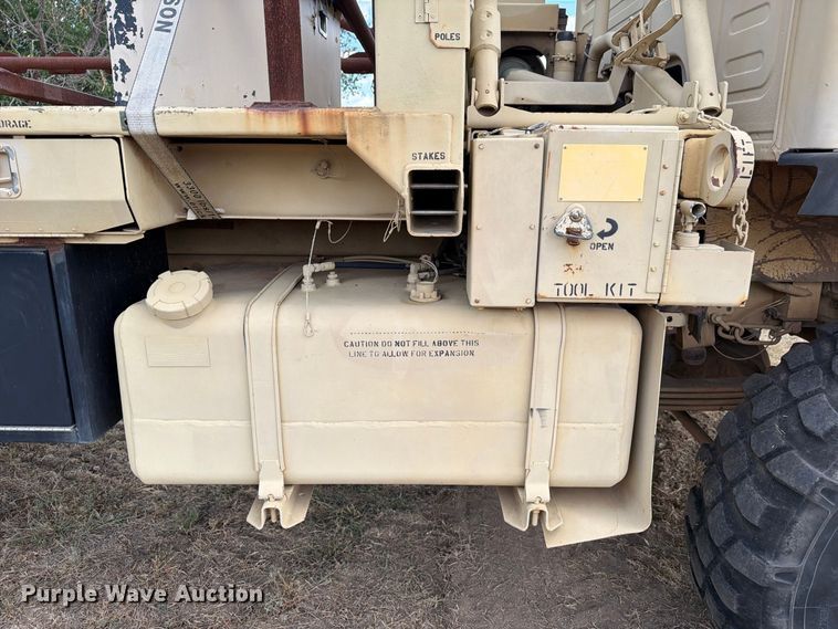 image for item FN3655 2004 Stewart & Stevenson 4X4 flatbed truck