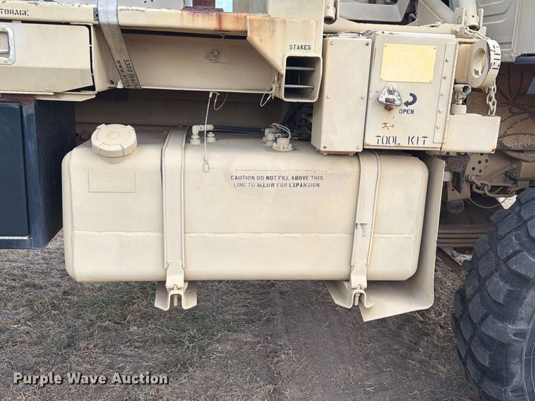 image for item FN3655 2004 Stewart & Stevenson 4X4 flatbed truck