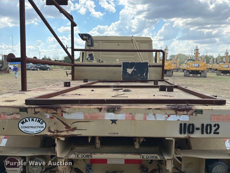 image for item FN3655 2004 Stewart & Stevenson 4X4 flatbed truck