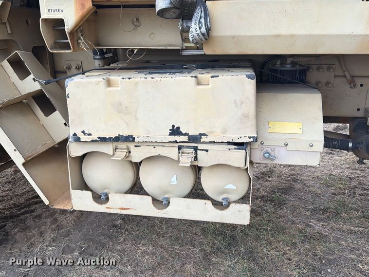 image for item FN3655 2004 Stewart & Stevenson 4X4 flatbed truck