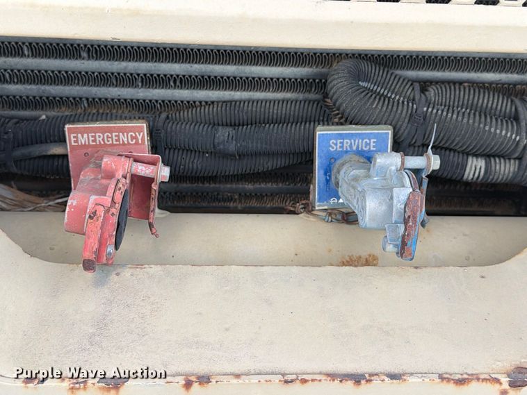 image for item FN3655 2004 Stewart & Stevenson 4X4 flatbed truck
