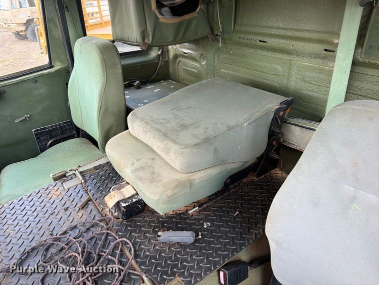 image for item FN3655 2004 Stewart & Stevenson 4X4 flatbed truck