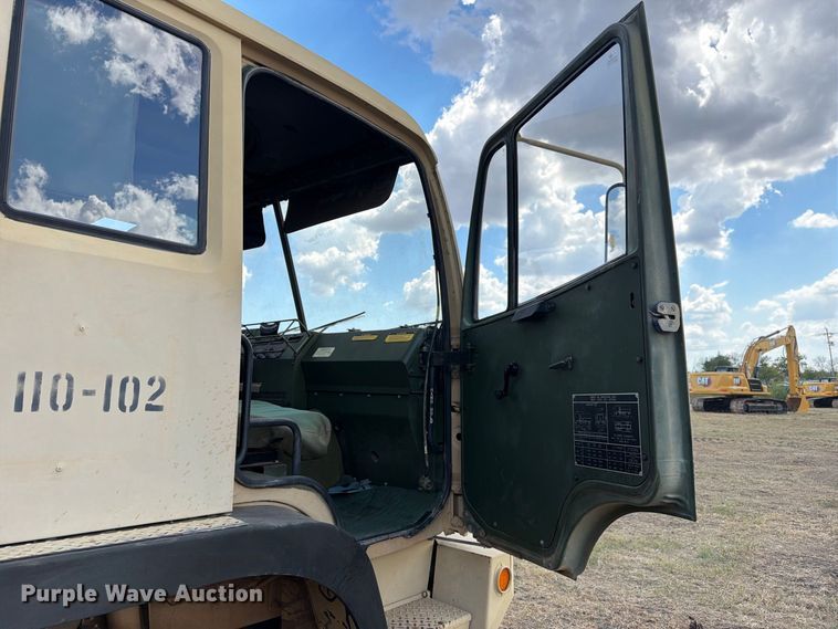 image for item FN3655 2004 Stewart & Stevenson 4X4 flatbed truck