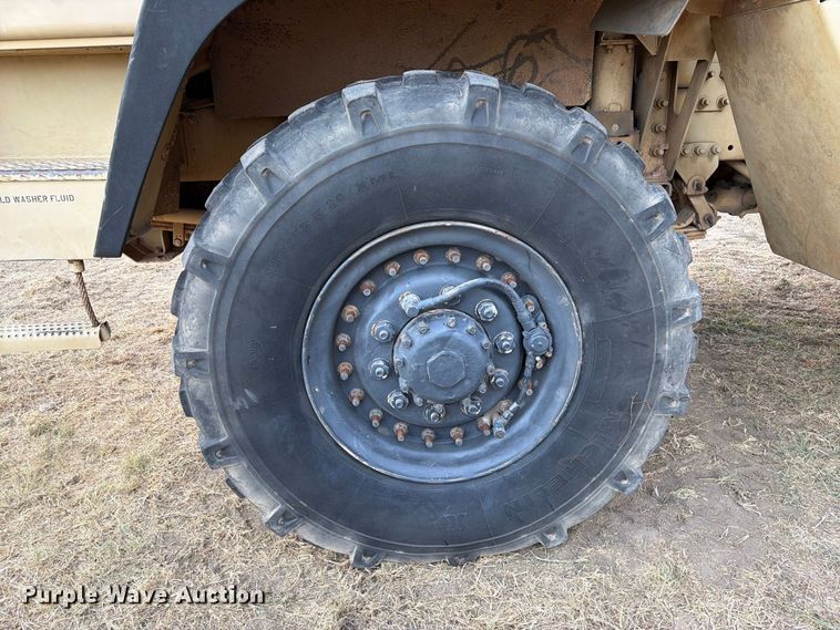 image for item FN3655 2004 Stewart & Stevenson 4X4 flatbed truck