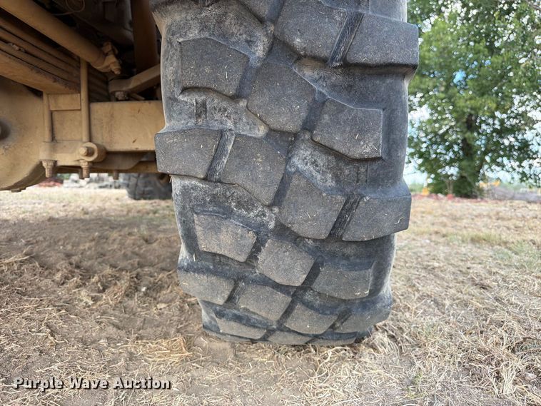 image for item FN3655 2004 Stewart & Stevenson 4X4 flatbed truck