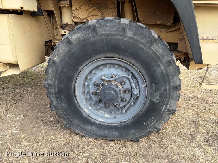 image for item FN3655 2004 Stewart & Stevenson 4X4 flatbed truck