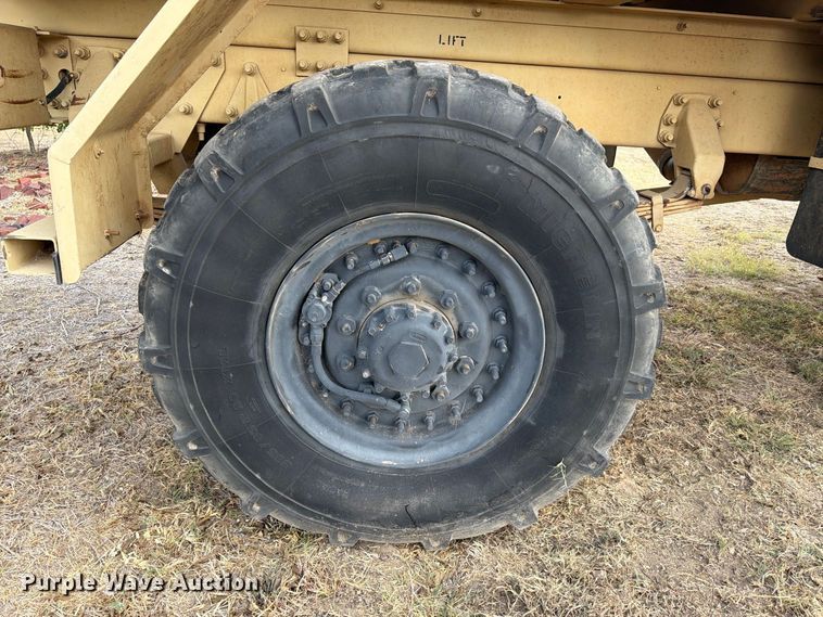 image for item FN3655 2004 Stewart & Stevenson 4X4 flatbed truck
