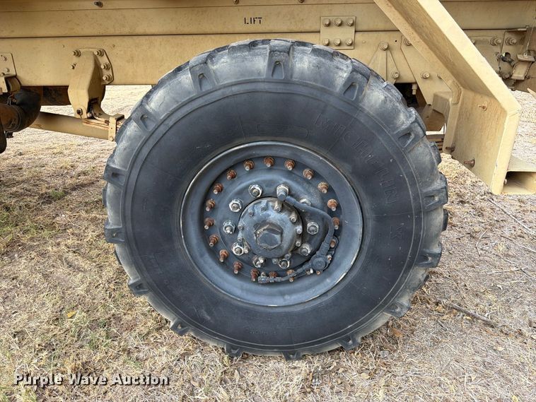 image for item FN3655 2004 Stewart & Stevenson 4X4 flatbed truck