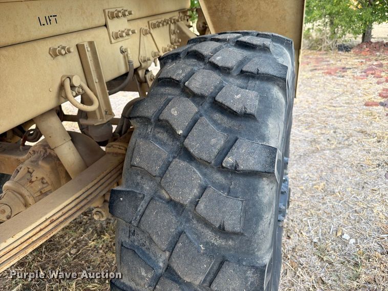 image for item FN3655 2004 Stewart & Stevenson 4X4 flatbed truck
