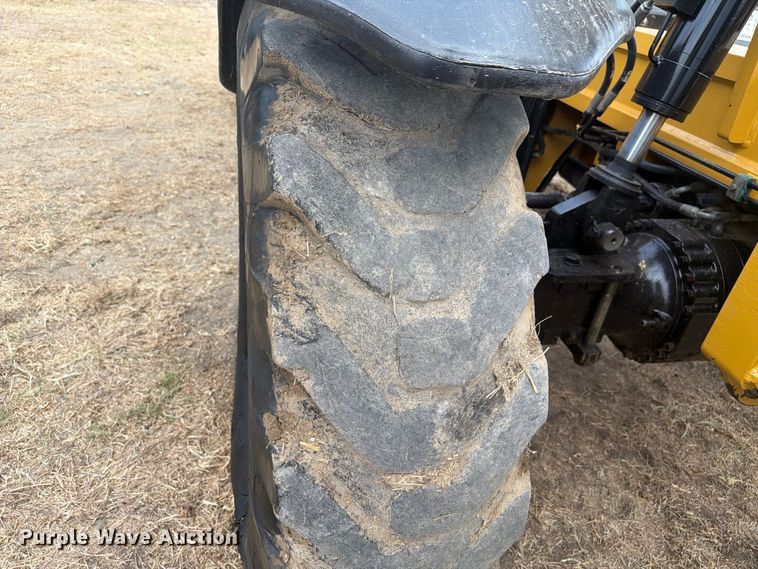 image for item FN3673 2013 Caterpillar TL1055C telehandler
