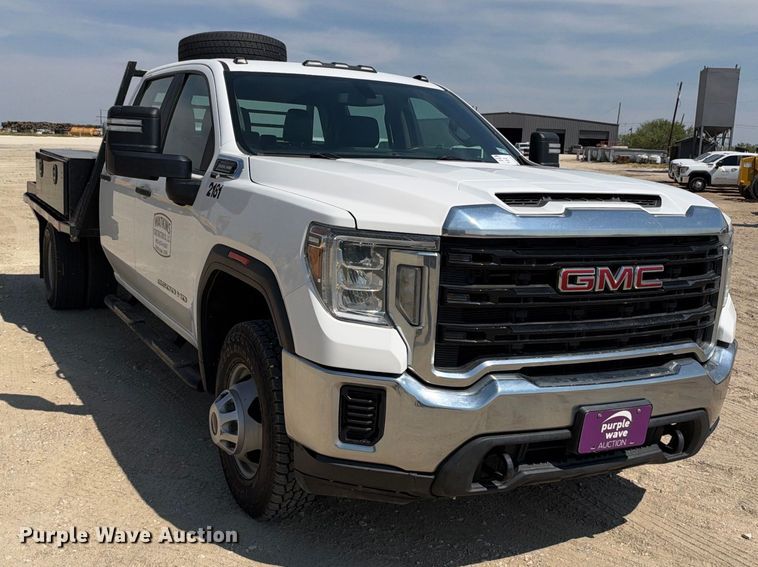 image for item FN3740 2021 GMC Sierra 3500 Crew Cab flatbed pickup truck