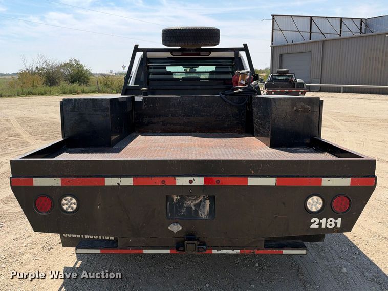 image for item FN3740 2021 GMC Sierra 3500 Crew Cab flatbed pickup truck