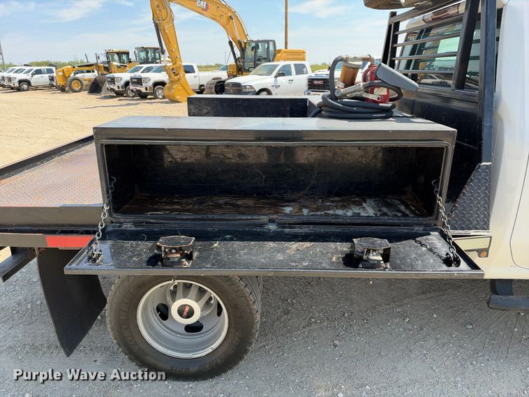 image for item FN3740 2021 GMC Sierra 3500 Crew Cab flatbed pickup truck