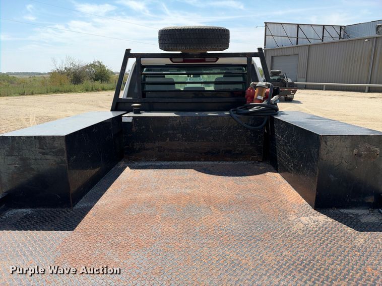 image for item FN3740 2021 GMC Sierra 3500 Crew Cab flatbed pickup truck