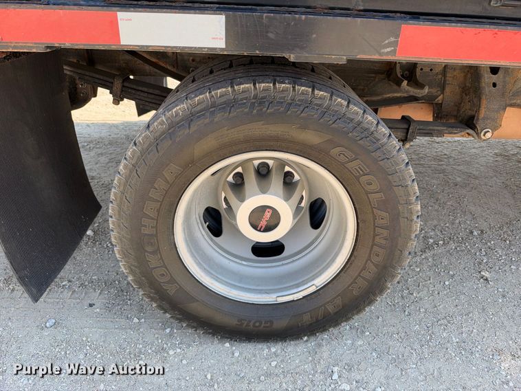 image for item FN3740 2021 GMC Sierra 3500 Crew Cab flatbed pickup truck