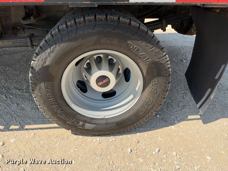 image for item FN3740 2021 GMC Sierra 3500 Crew Cab flatbed pickup truck