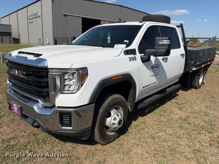 image for item FN3741 2021 GMC Sierra 3500 4X4 Crew Cab flatbed pickup truck
