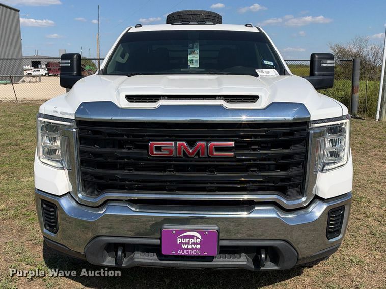 image for item FN3741 2021 GMC Sierra 3500 4X4 Crew Cab flatbed pickup truck
