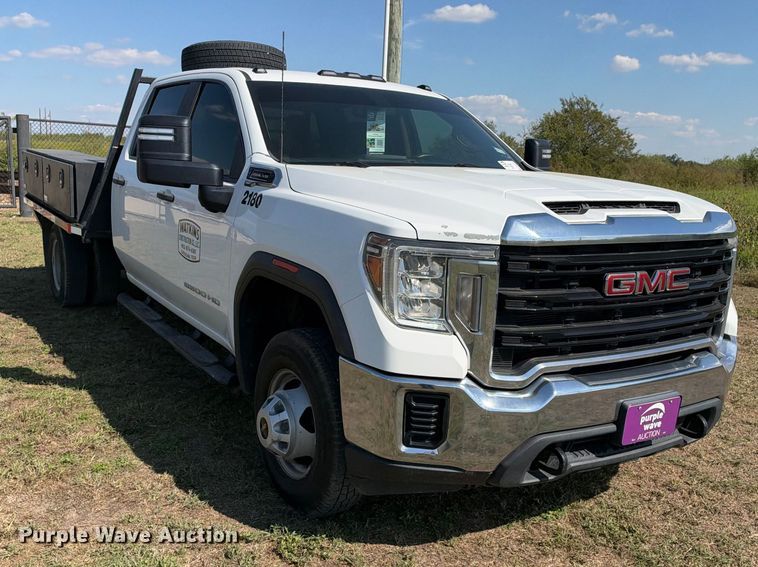 image for item FN3741 2021 GMC Sierra 3500 4X4 Crew Cab flatbed pickup truck
