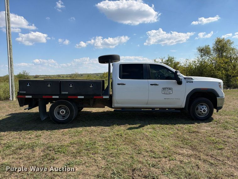 image for item FN3741 2021 GMC Sierra 3500 4X4 Crew Cab flatbed pickup truck
