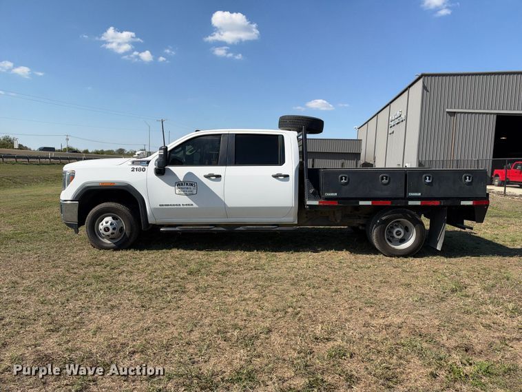 image for item FN3741 2021 GMC Sierra 3500 4X4 Crew Cab flatbed pickup truck