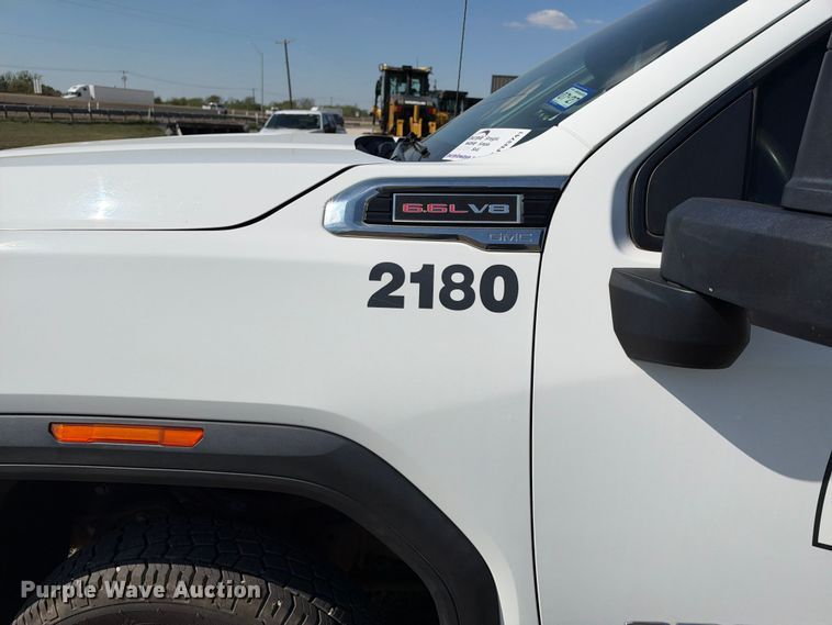image for item FN3741 2021 GMC Sierra 3500 4X4 Crew Cab flatbed pickup truck