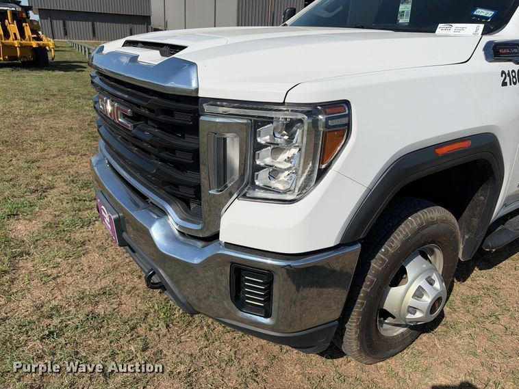 image for item FN3741 2021 GMC Sierra 3500 4X4 Crew Cab flatbed pickup truck