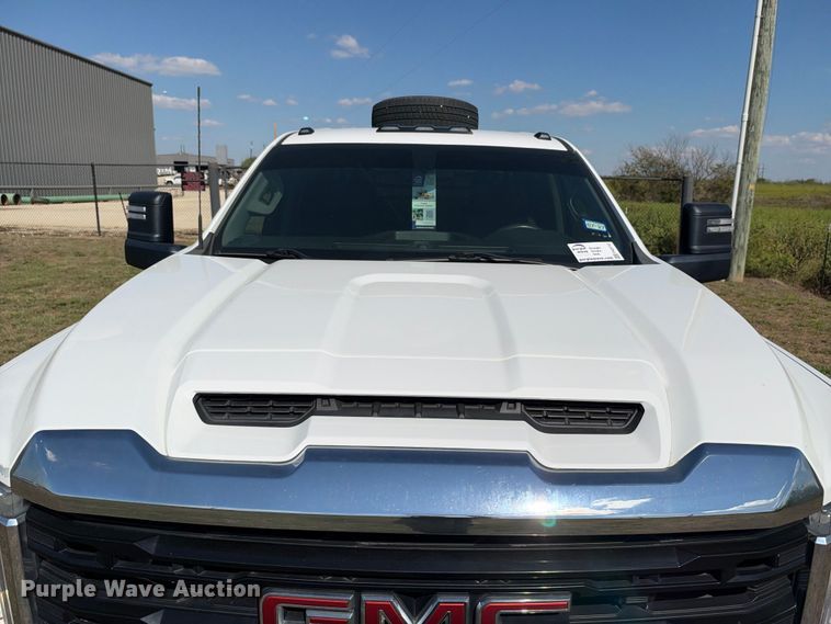 image for item FN3741 2021 GMC Sierra 3500 4X4 Crew Cab flatbed pickup truck