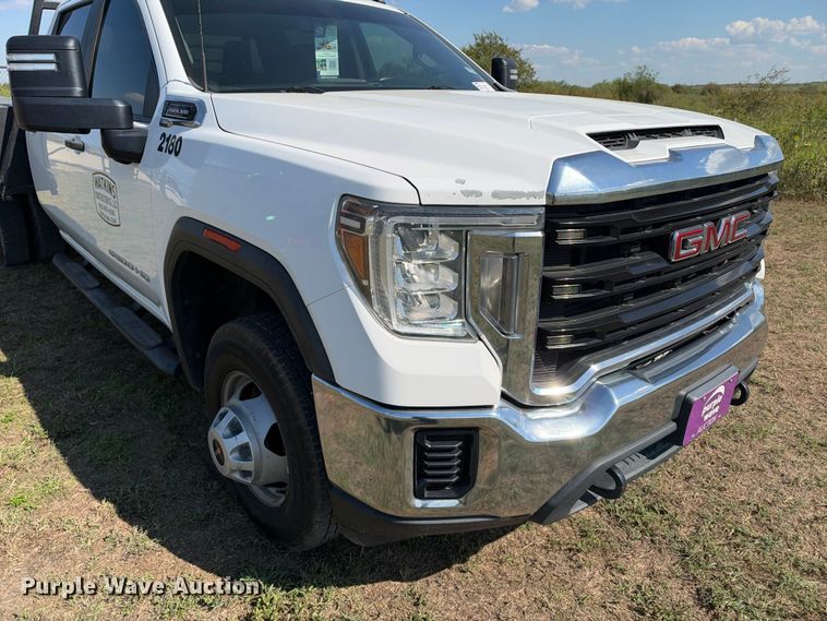 image for item FN3741 2021 GMC Sierra 3500 4X4 Crew Cab flatbed pickup truck