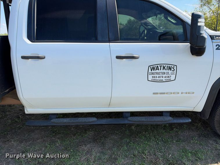image for item FN3741 2021 GMC Sierra 3500 4X4 Crew Cab flatbed pickup truck