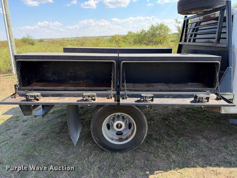 image for item FN3741 2021 GMC Sierra 3500 4X4 Crew Cab flatbed pickup truck