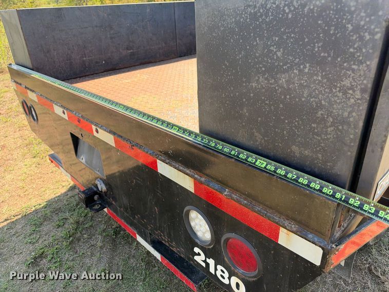 image for item FN3741 2021 GMC Sierra 3500 4X4 Crew Cab flatbed pickup truck