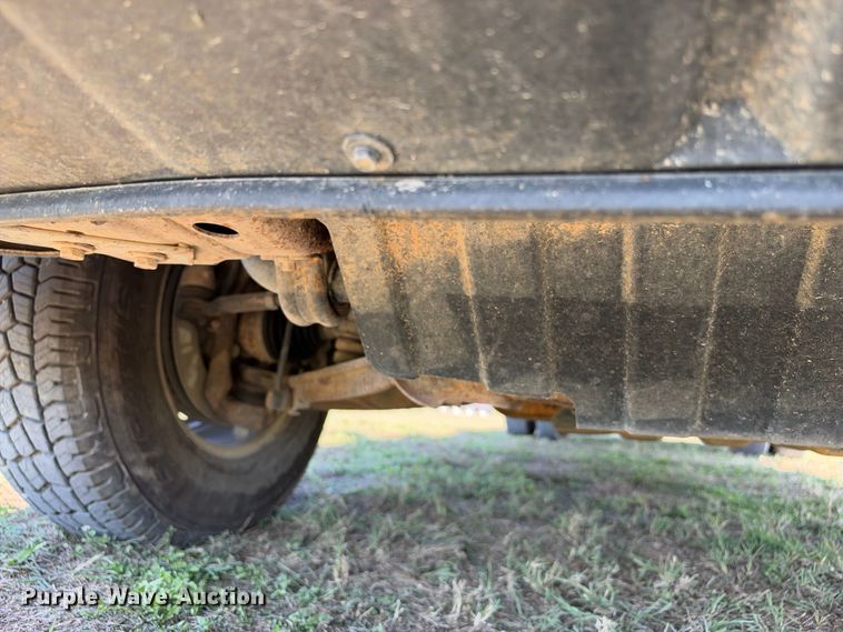 image for item FN3741 2021 GMC Sierra 3500 4X4 Crew Cab flatbed pickup truck