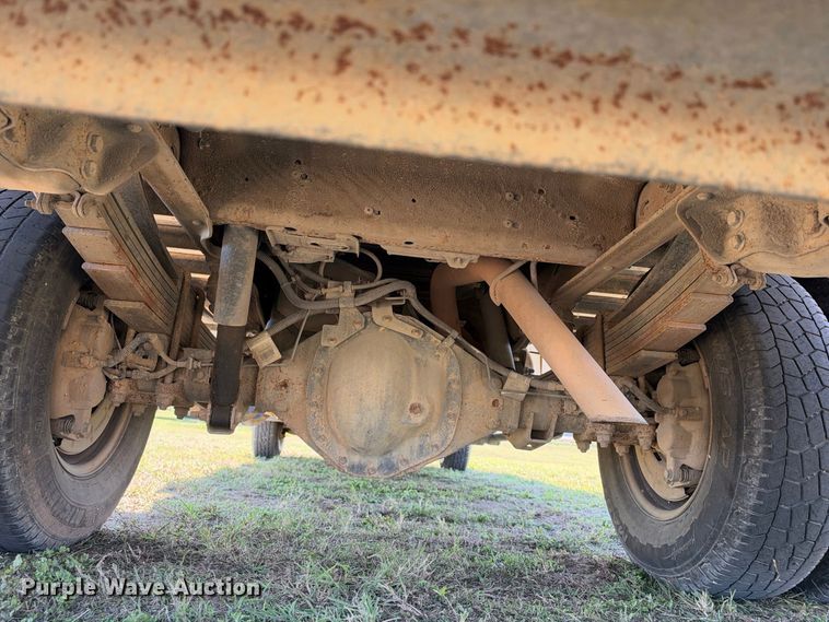 image for item FN3741 2021 GMC Sierra 3500 4X4 Crew Cab flatbed pickup truck
