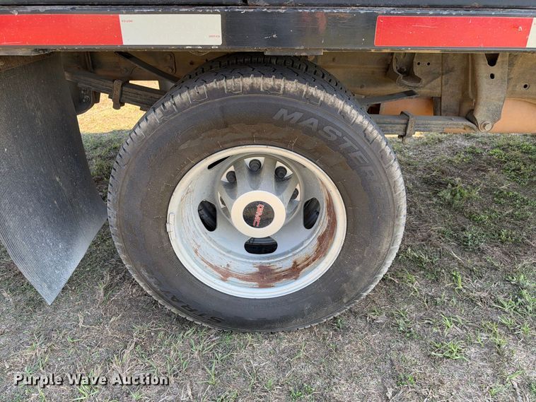 image for item FN3741 2021 GMC Sierra 3500 4X4 Crew Cab flatbed pickup truck