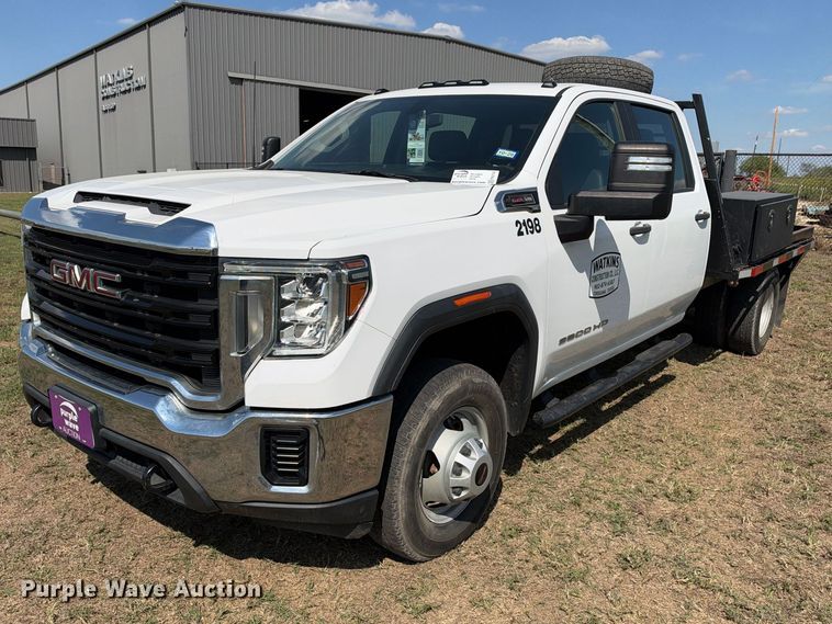 image for item FN3742 2021 GMC Sierra 3500 4X4 Crew Cab flatbed pickup truck