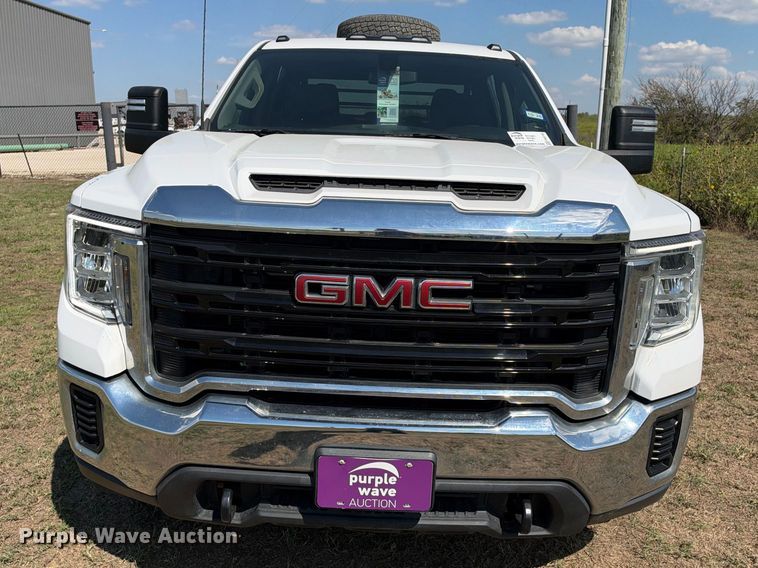 image for item FN3742 2021 GMC Sierra 3500 4X4 Crew Cab flatbed pickup truck