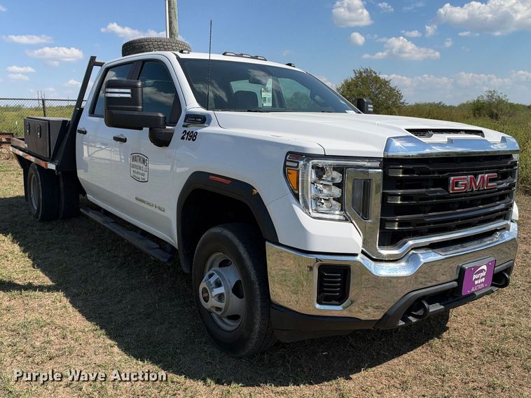 image for item FN3742 2021 GMC Sierra 3500 4X4 Crew Cab flatbed pickup truck