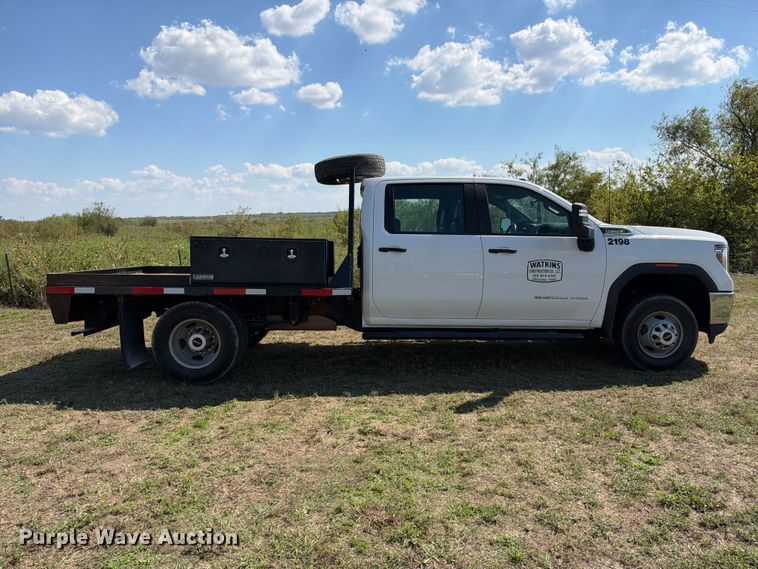 image for item FN3742 2021 GMC Sierra 3500 4X4 Crew Cab flatbed pickup truck