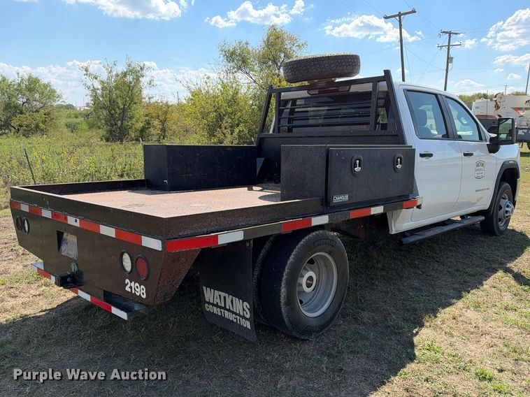 image for item FN3742 2021 GMC Sierra 3500 4X4 Crew Cab flatbed pickup truck