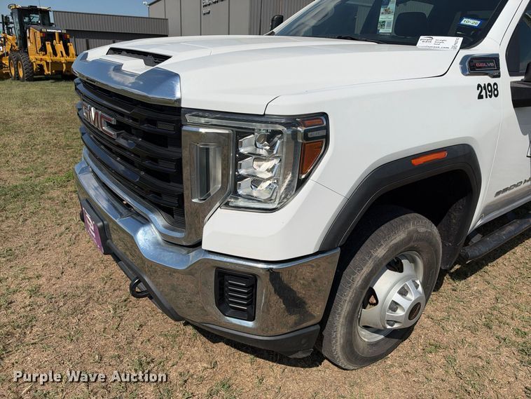 image for item FN3742 2021 GMC Sierra 3500 4X4 Crew Cab flatbed pickup truck