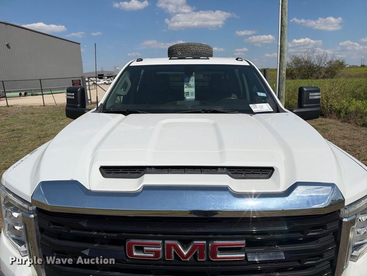 image for item FN3742 2021 GMC Sierra 3500 4X4 Crew Cab flatbed pickup truck