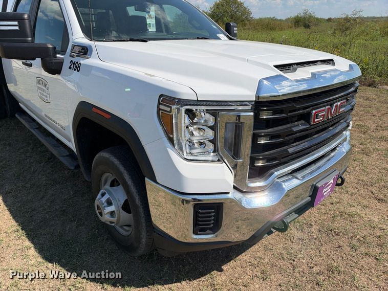 image for item FN3742 2021 GMC Sierra 3500 4X4 Crew Cab flatbed pickup truck