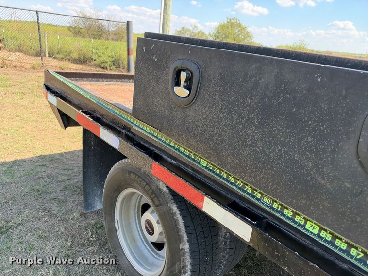 image for item FN3742 2021 GMC Sierra 3500 4X4 Crew Cab flatbed pickup truck