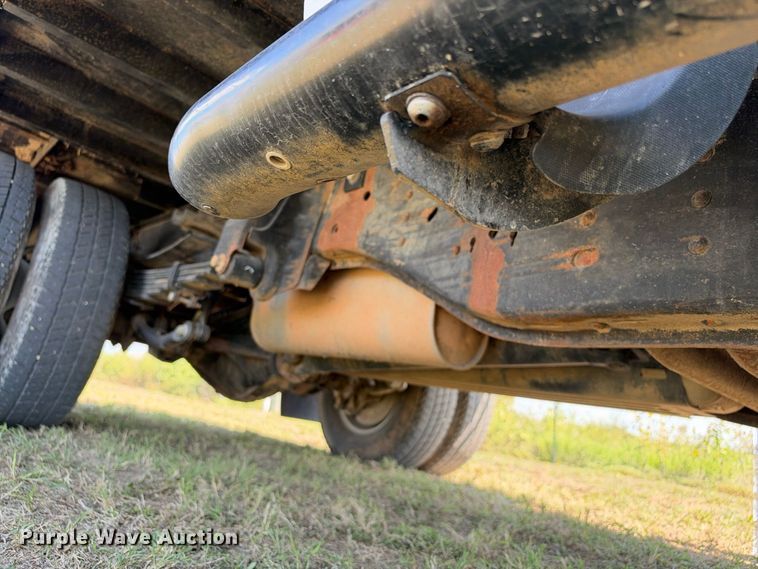 image for item FN3742 2021 GMC Sierra 3500 4X4 Crew Cab flatbed pickup truck