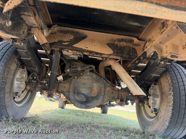 image for item FN3742 2021 GMC Sierra 3500 4X4 Crew Cab flatbed pickup truck