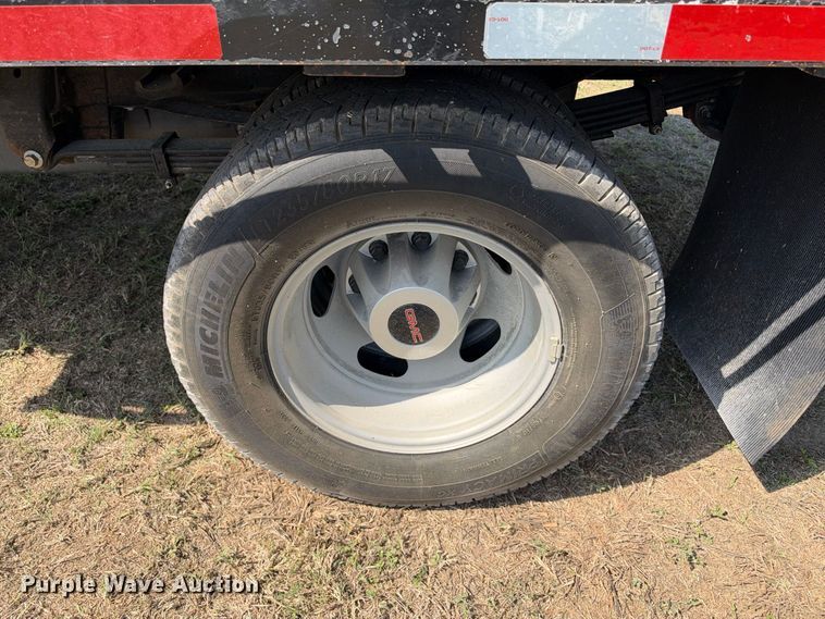 image for item FN3742 2021 GMC Sierra 3500 4X4 Crew Cab flatbed pickup truck