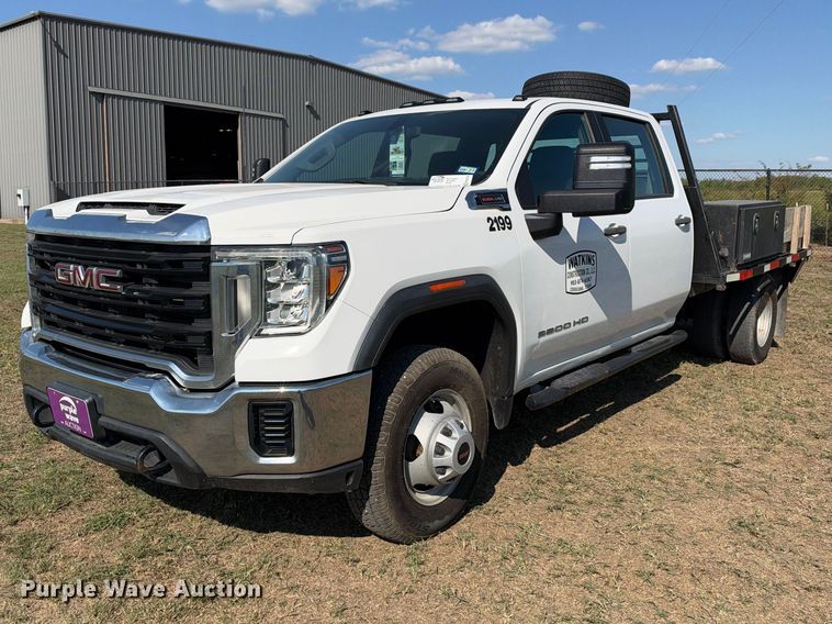 image for item FN3744 2021 GMC Sierra 3500 4X4 Crew Cab flatbed pickup truck